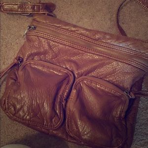 A brown leather purse
